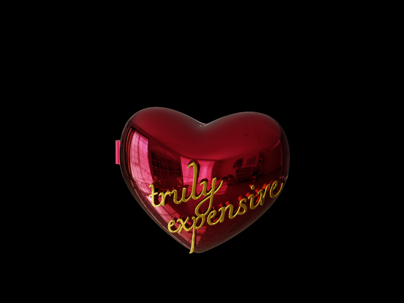 A heart locket, shut, with the words truly expensive in gold on its
          front